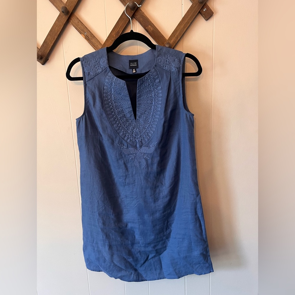 Sleeveless linen shift dress with embroidered neckline details